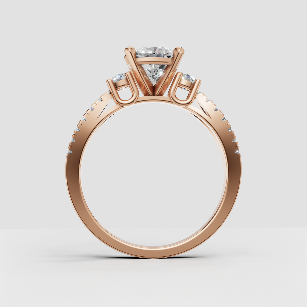 Classic yellow gold three stone engagement ring