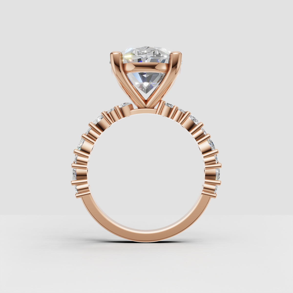 Oval diamond anniversary ring with detailed diamond accent shoulders