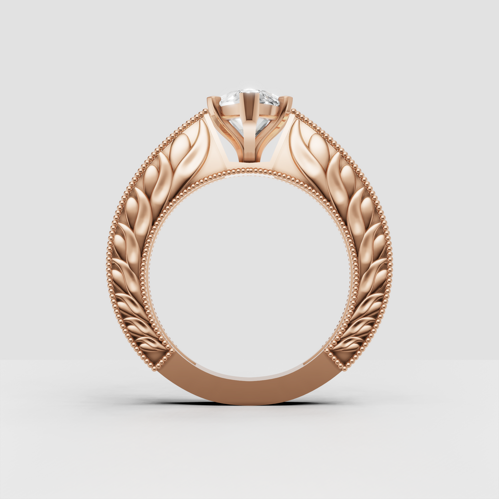 Detailed vintage marquise engagement ring in polished yellow gold