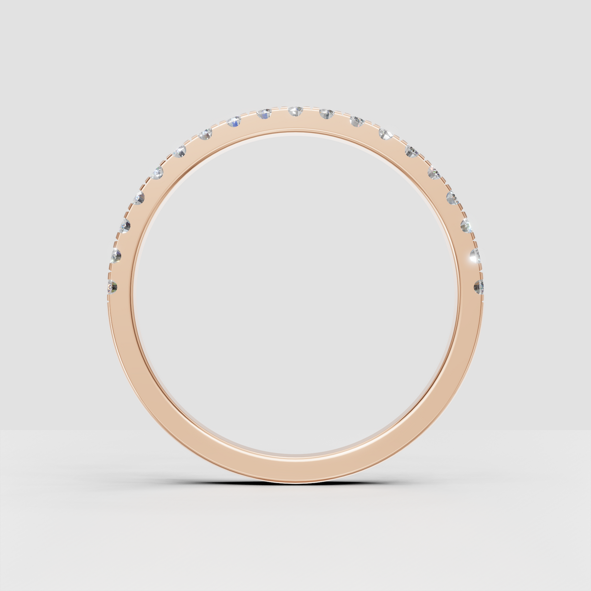 Classic yellow gold diamond stacking band with round cut stones