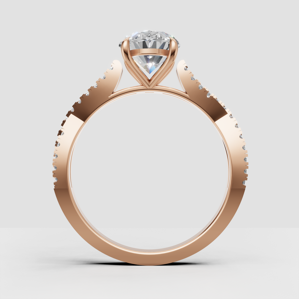 Pear shaped diamond ring with four-prong center setting and pavé band