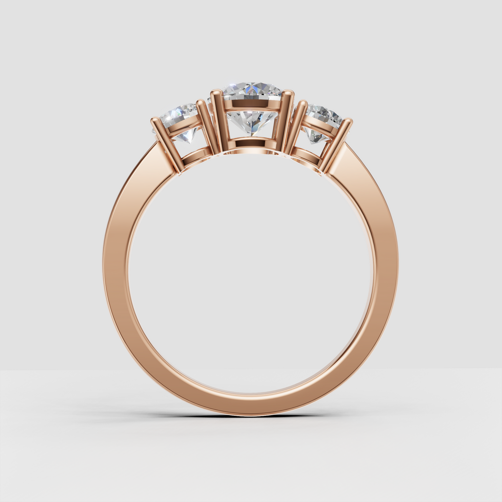 Classic round Diamond engagement ring with two round accent stones