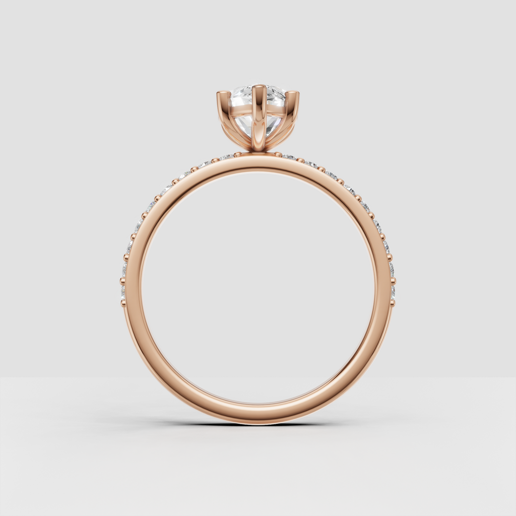 Marquise diamond engagement ring showing detailed pave shoulders