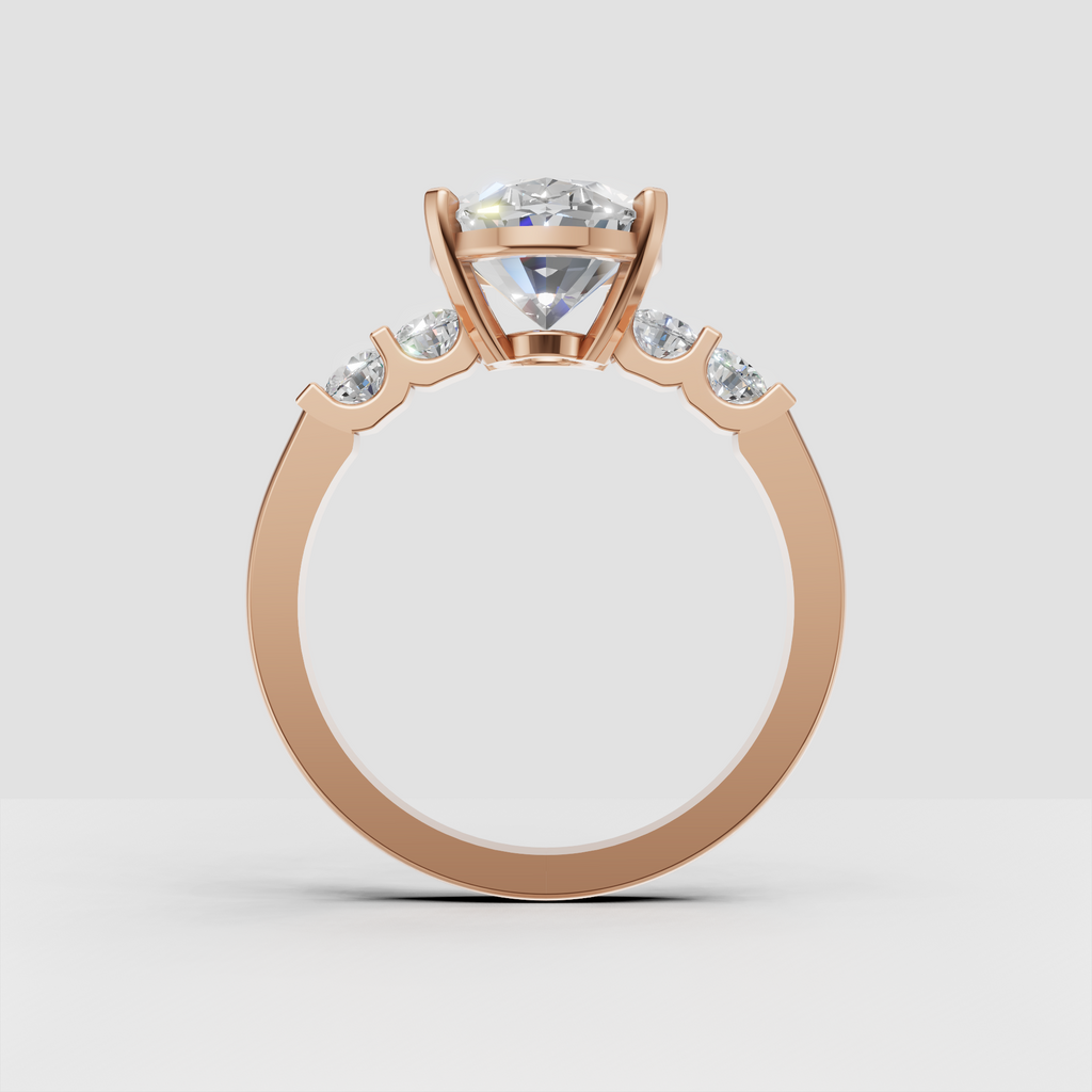 Elegant five stone diamond ring with oval center and round accent stones