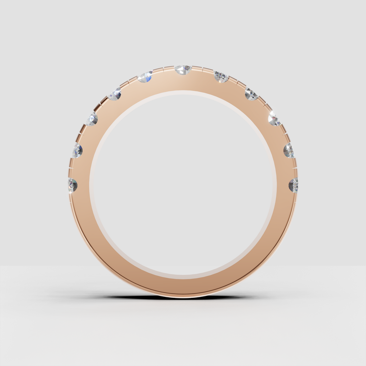 Round diamond minimalist wedding band from angled view