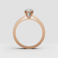 Four-prong oval diamond engagement ring in gold