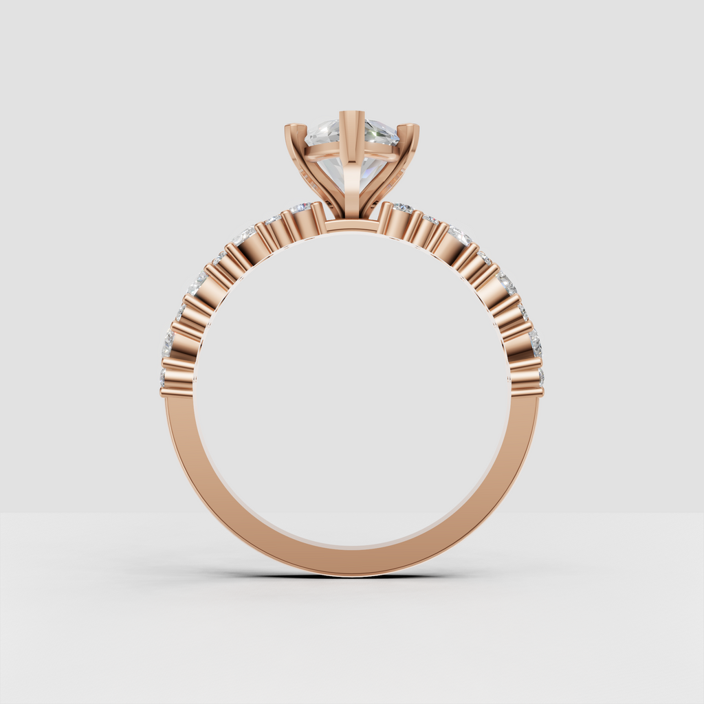 Sophisticated pear diamond ring with partially diamond-set band