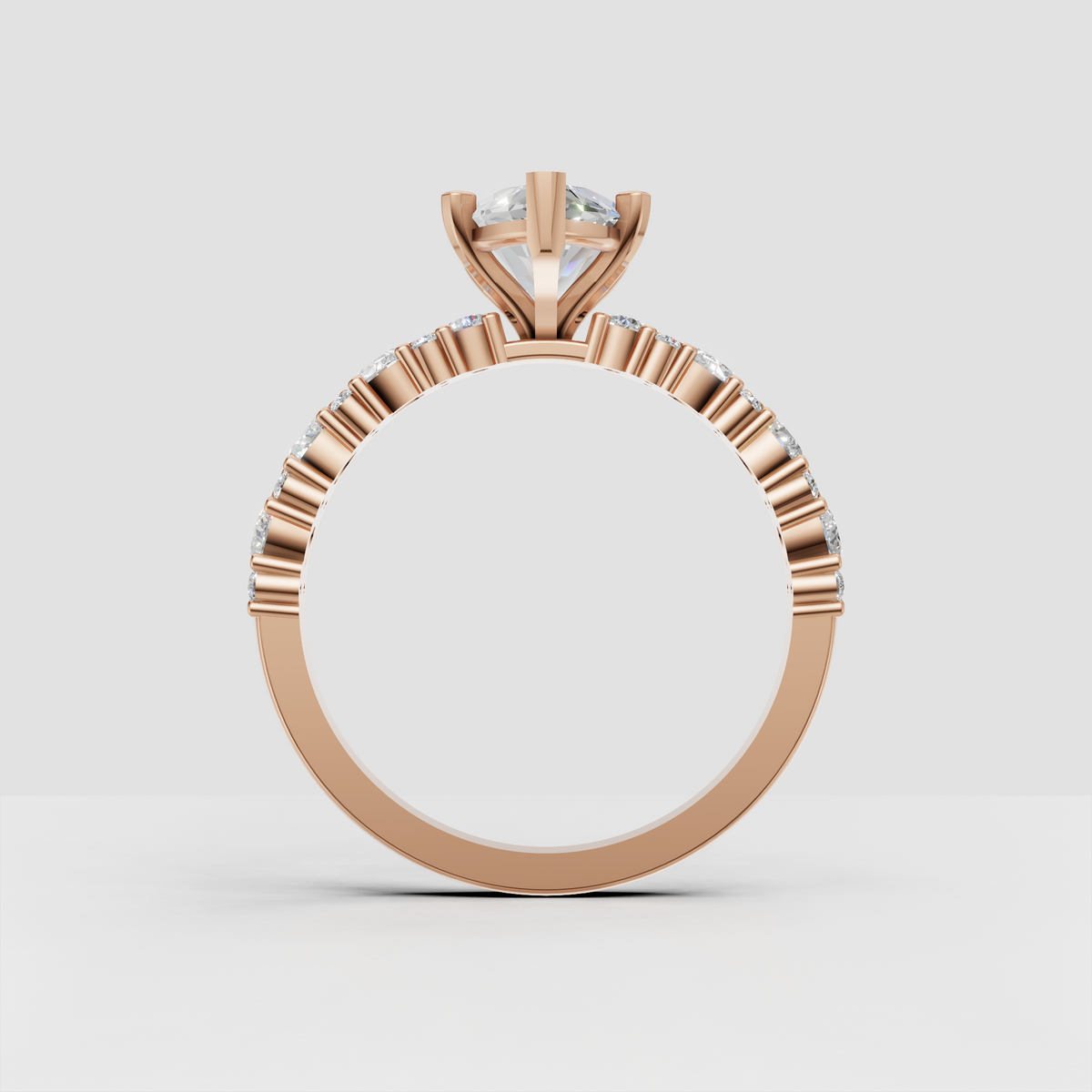 Sophisticated pear diamond ring with partially diamond-set band