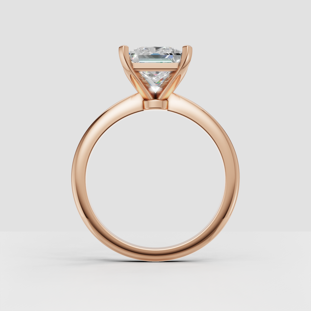 Square-cut diamond ring with four-prong raised setting