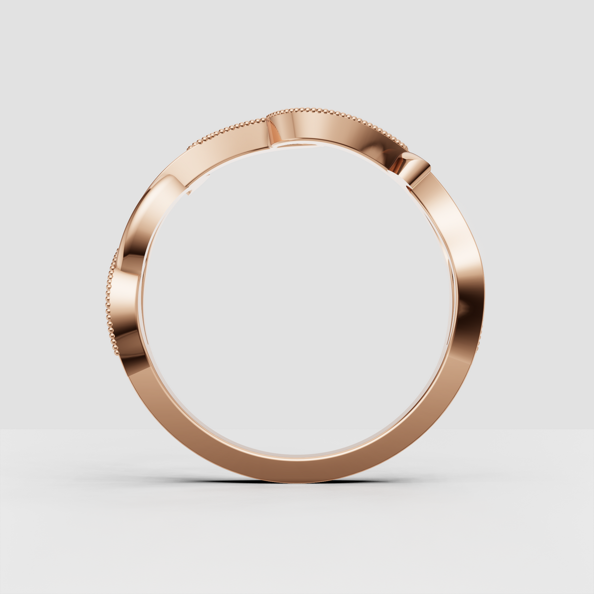 Open design diamond bypass band with intertwined strands