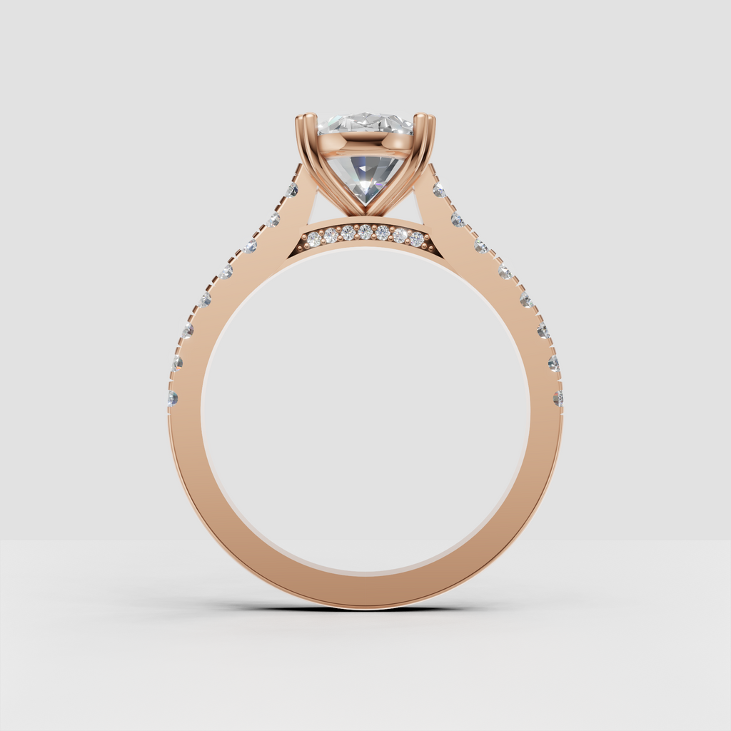 Modern oval engagement ring with elevated four-prong center setting