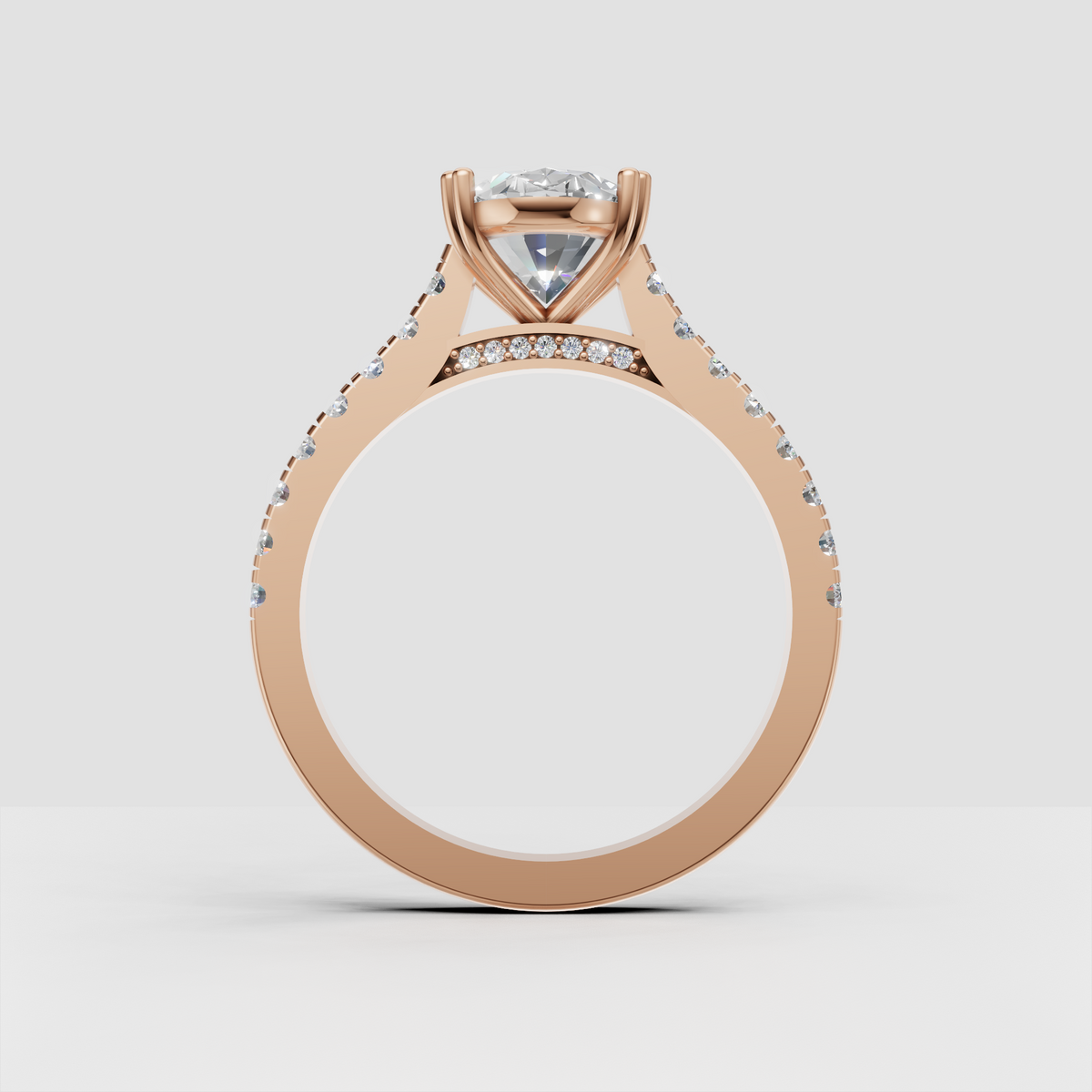 Modern oval engagement ring with elevated four-prong center setting