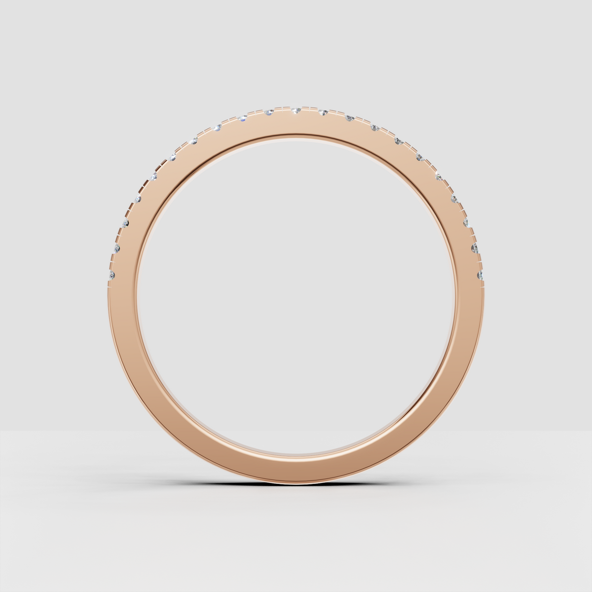 Round brilliant diamond bar-set ring shown from multiple angles