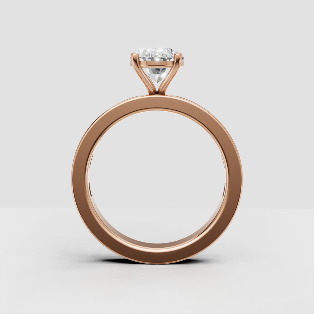 Oval diamond engagement ring with rectangular baguette side stones