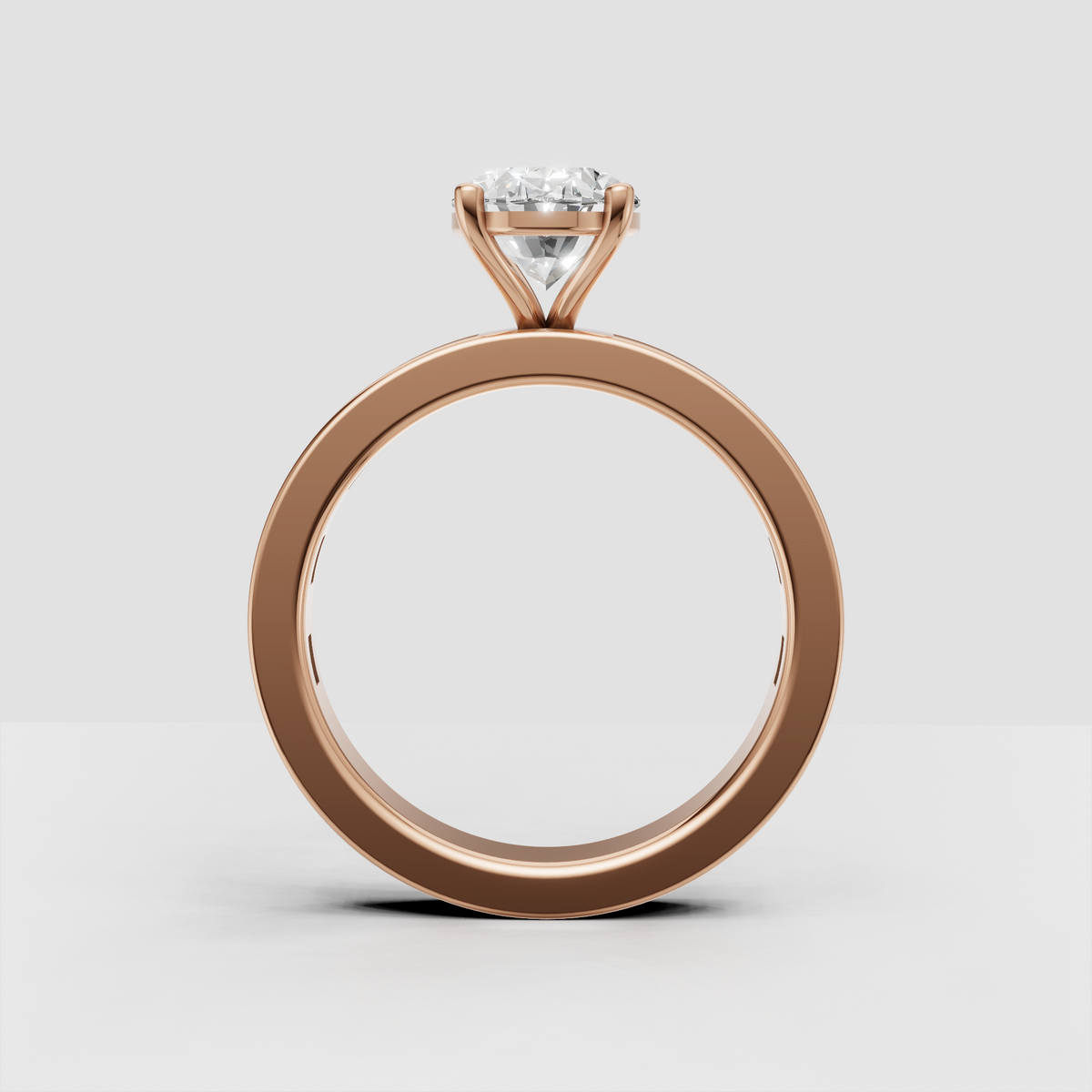 Oval diamond engagement ring with rectangular baguette side stones