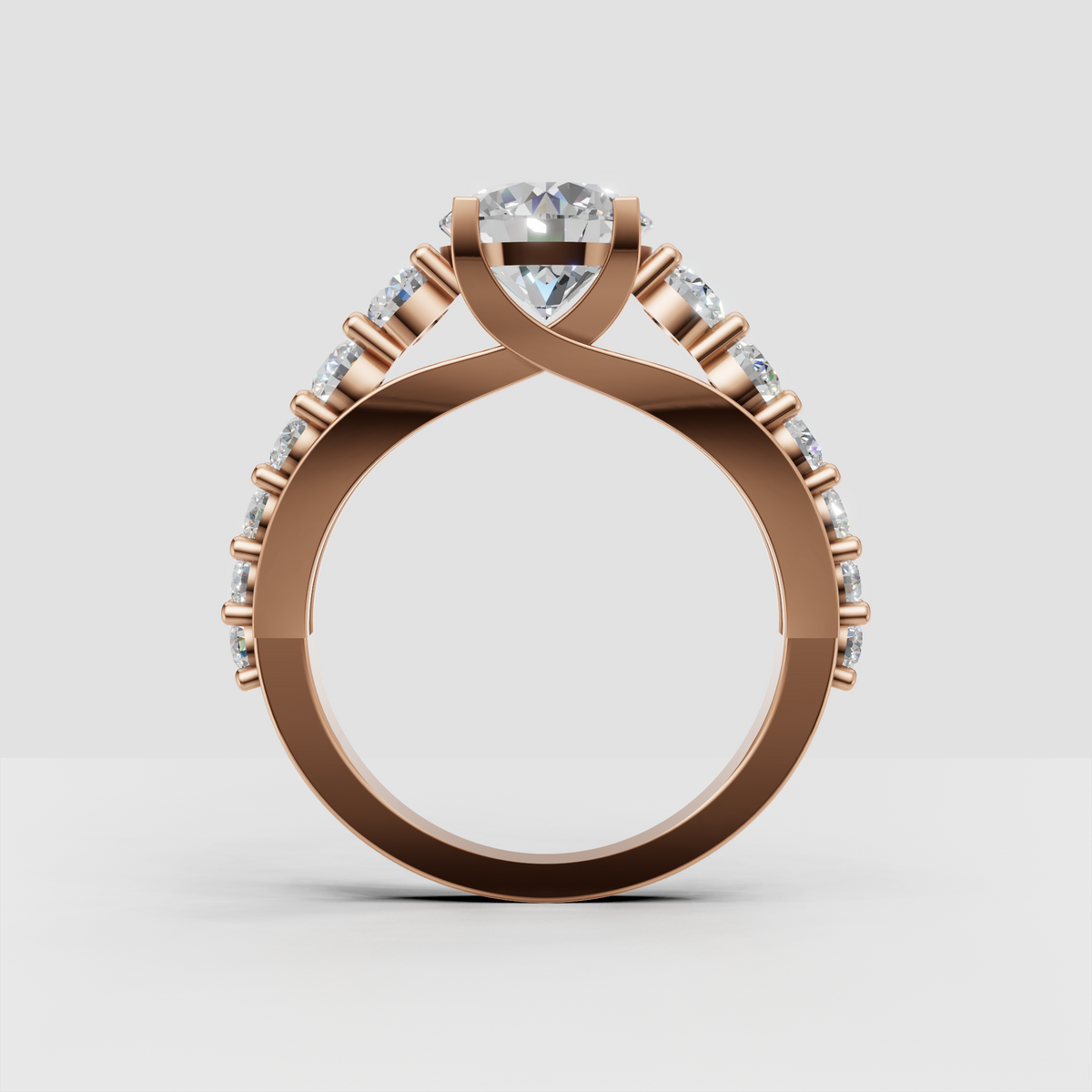 Round cut diamond engagement ring with crossover shoulder design