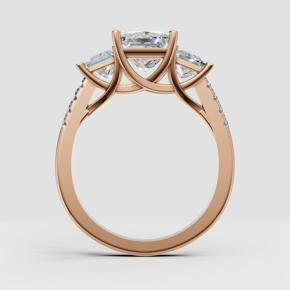Princess cut diamond bridal ring with matching side stones and pave band
