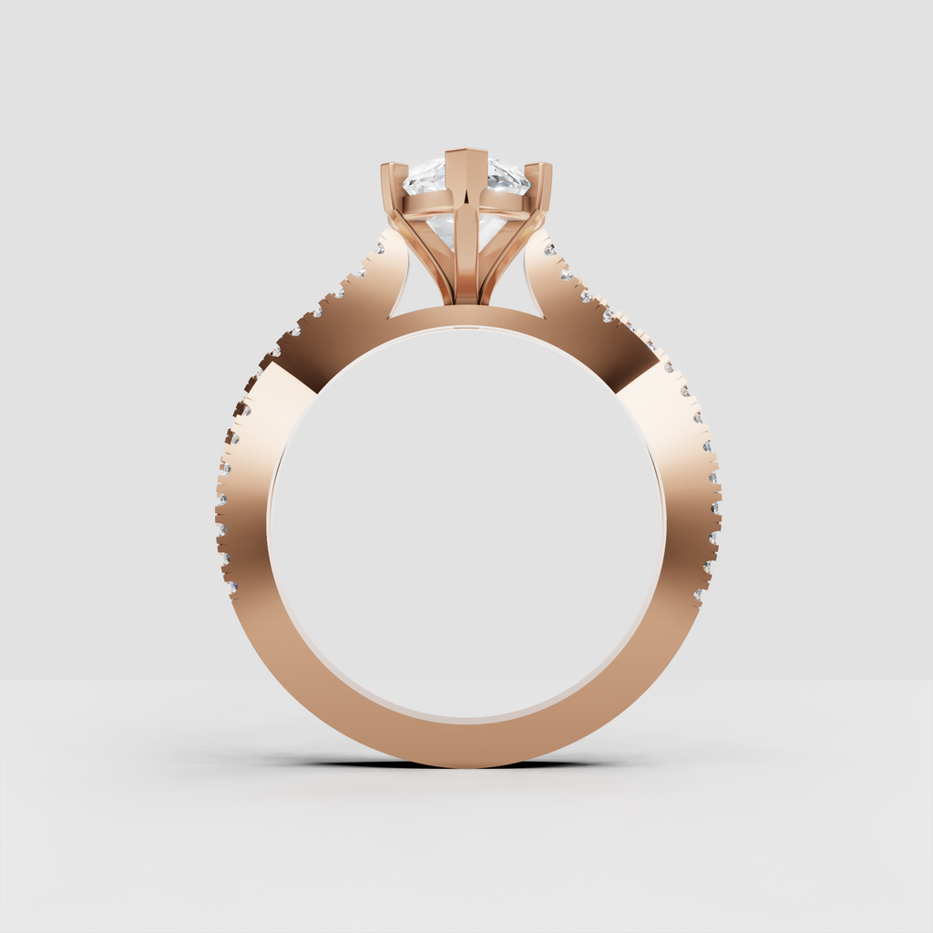 Marquise shaped diamond engagement ring in polished yellow gold with sparkling stones along both shoulders.