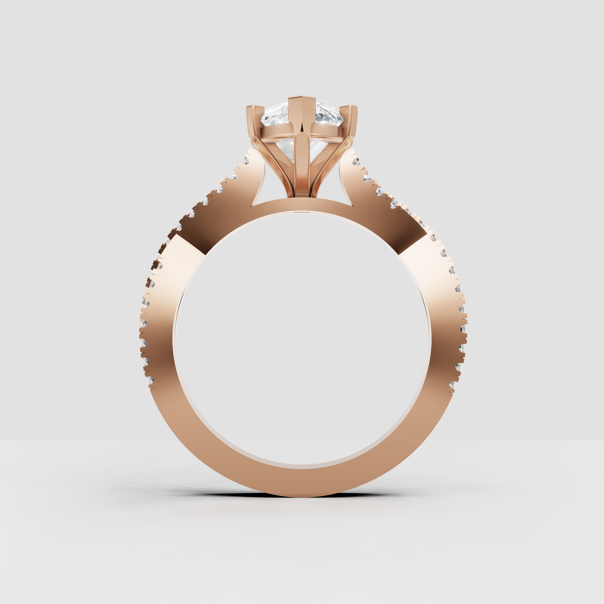 Marquise shaped diamond engagement ring in polished yellow gold with sparkling stones along both shoulders.