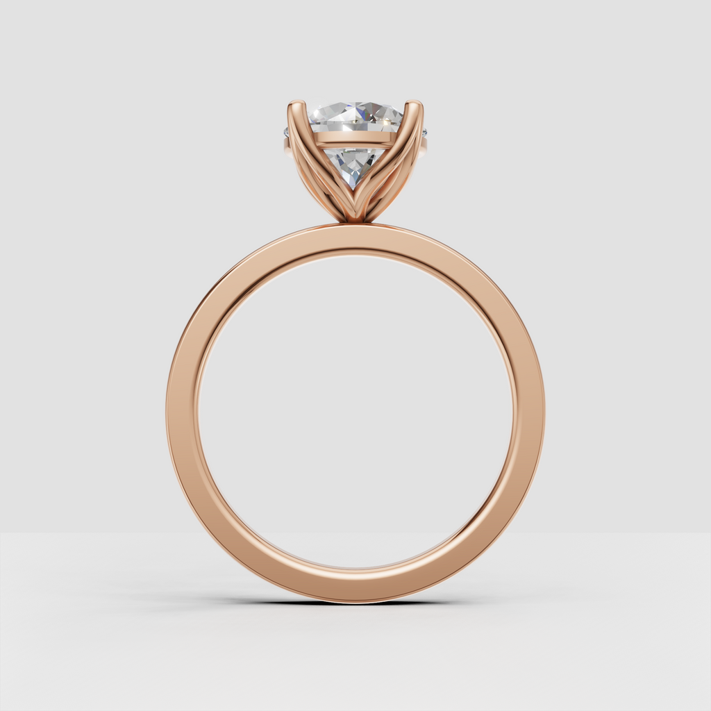 Elegant four-prong round diamond bridal ring in yellow gold