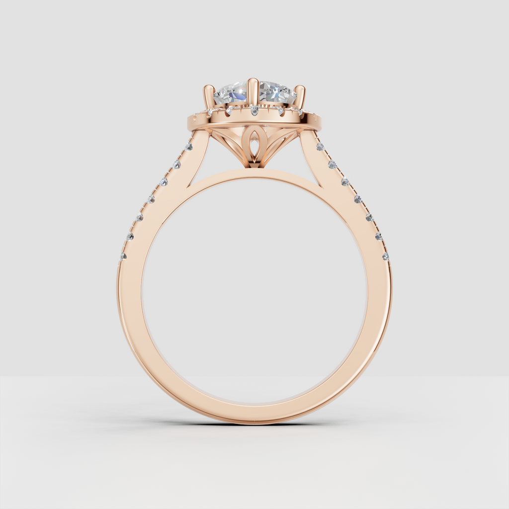 Four-prong cushion cut diamond engagement ring with full halo design