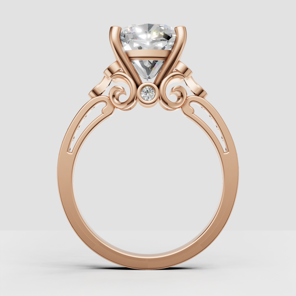 Cushion center diamond secured by rounded gold prongs