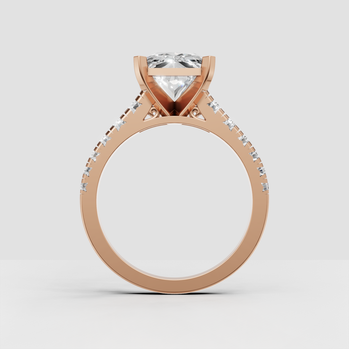 Radiant diamond engagement ring with polished gold architectural setting