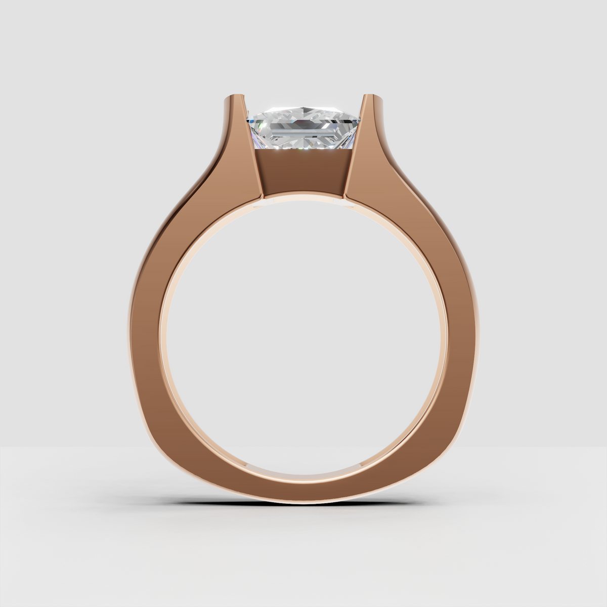Square diamond engagement ring with sleek polished setting