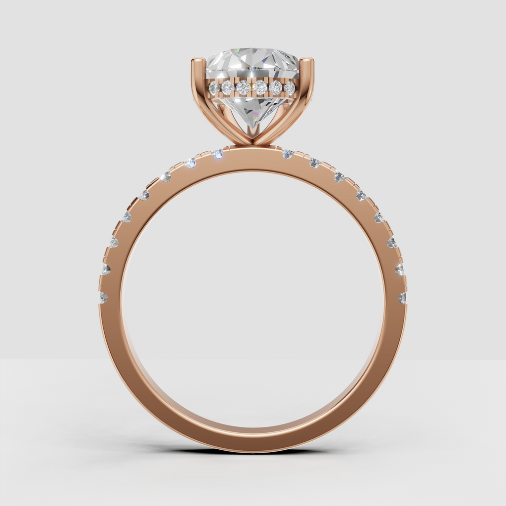 Pear Diamond engagement ring with elevated open gallery and pavé shoulders