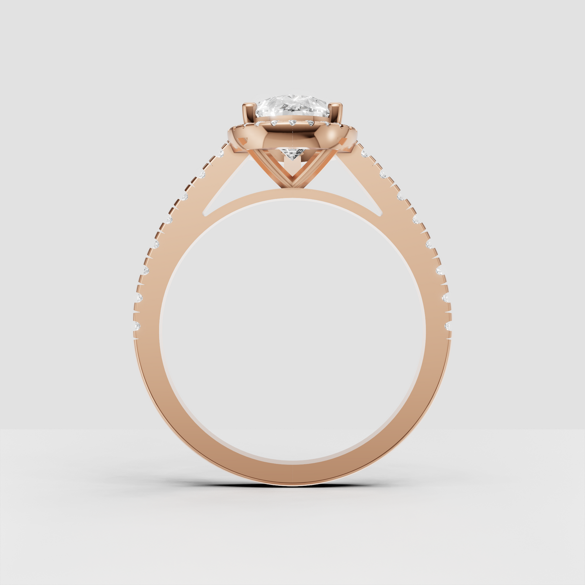 Pear diamond engagement ring with four-prong center setting