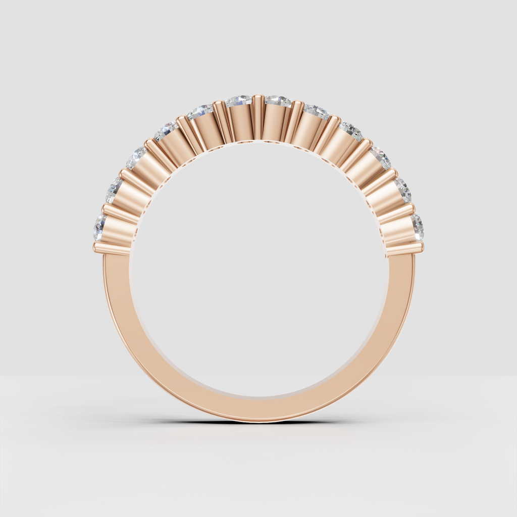 Round brilliant diamond band with continuous gemstone coverage and gold settings