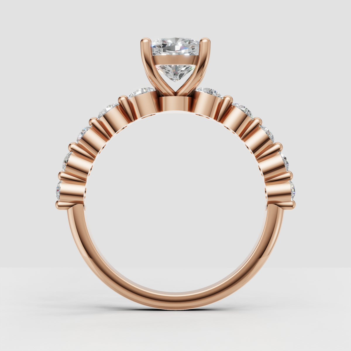 Cushion diamond ring with half-eternity pavé-style shoulders