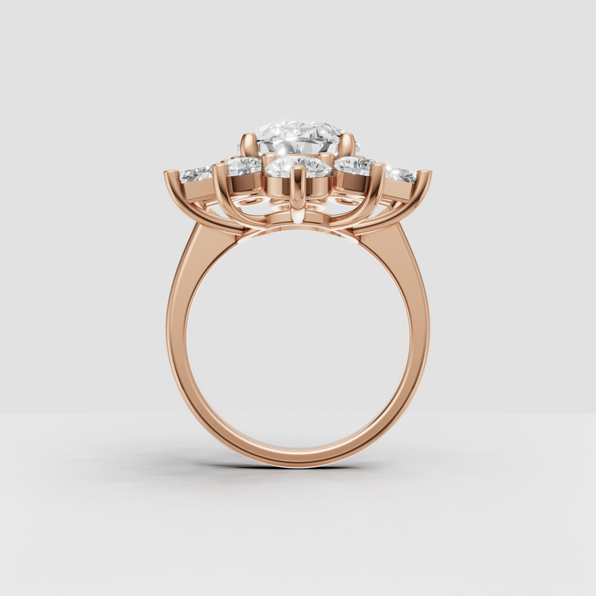 Oval diamond anniversary ring with floral cluster setting