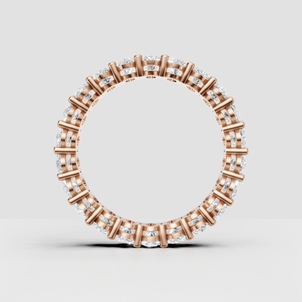 Close view of oval cut diamonds on a full eternity wedding band