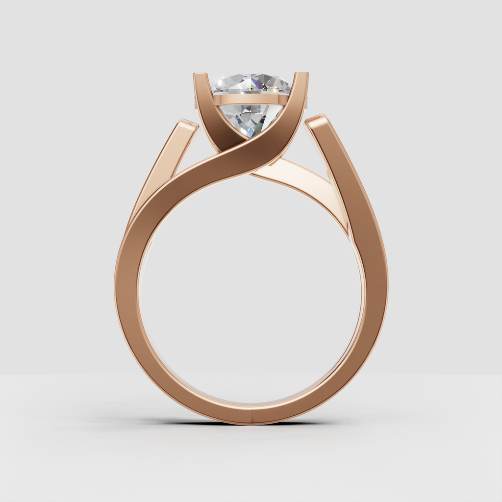 Round diamond engagement ring with sweeping crossover gold band