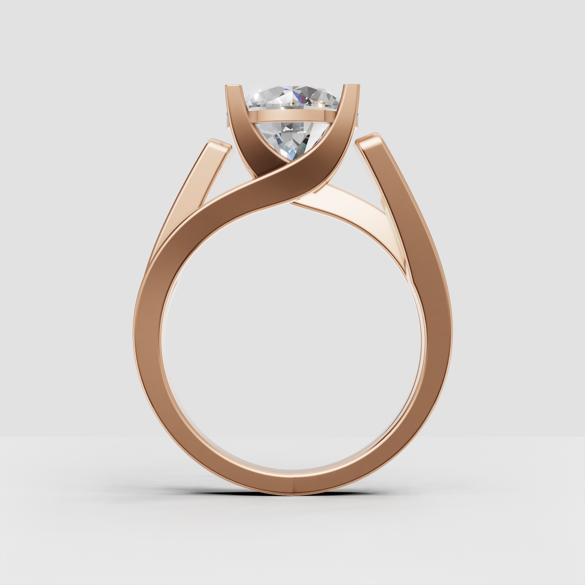 Round diamond engagement ring with sweeping crossover gold band