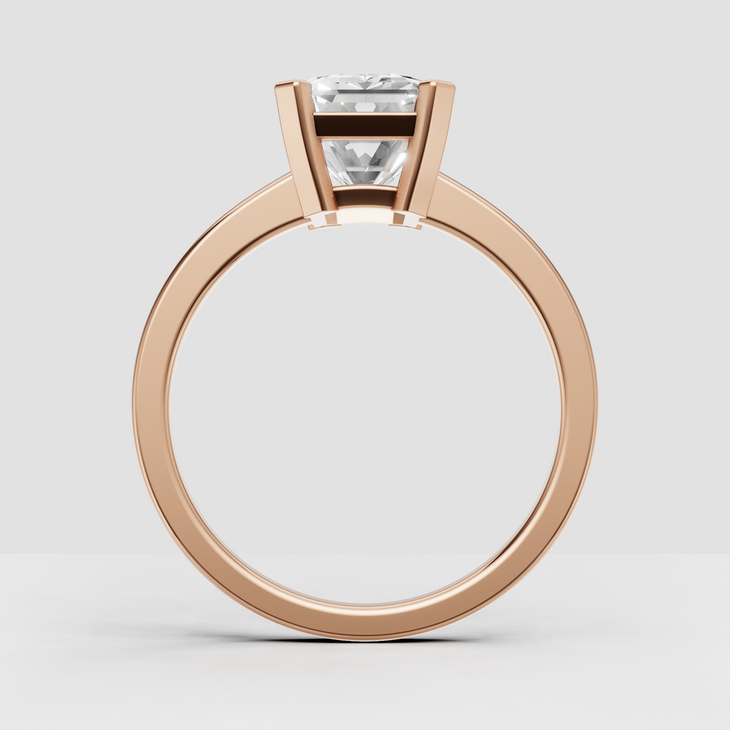Modern emerald cut solitaire engagement ring