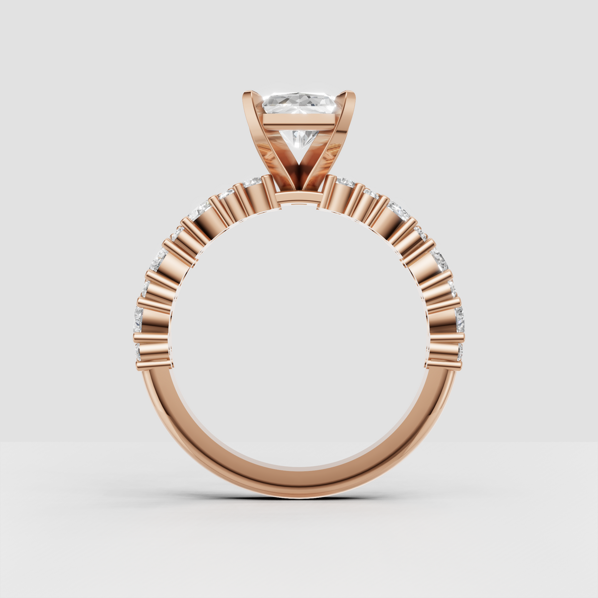Sophisticated radiant cut diamond ring with four-prong gold solitaire setting