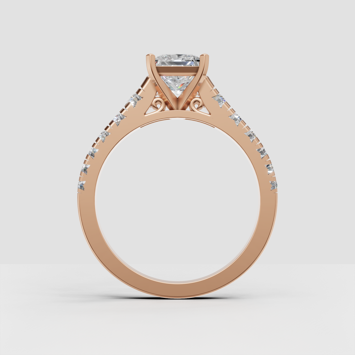 Princess cut center diamond with diamond accented shoulders