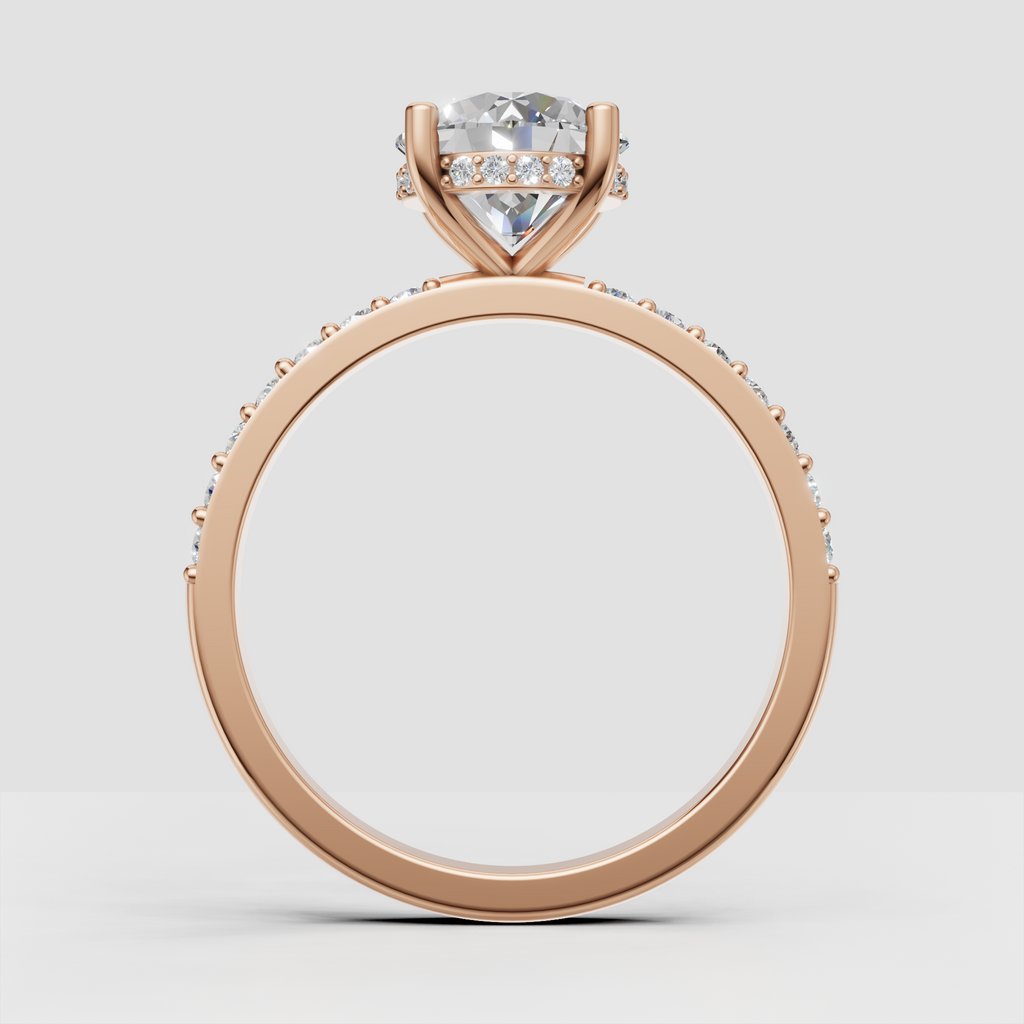 Four-prong diamond engagement ring with intricate under-gallery detailing