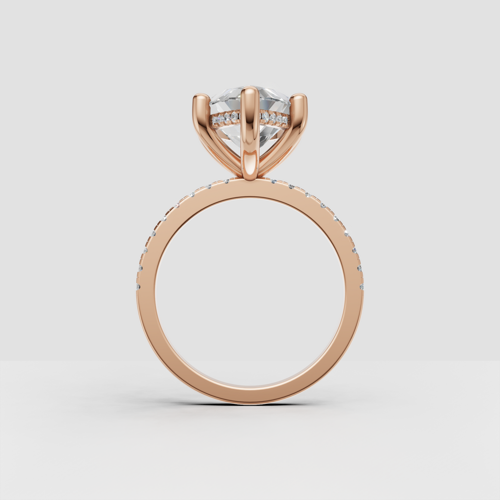 Marquise diamond ring showing detailed pave band craftsmanship
