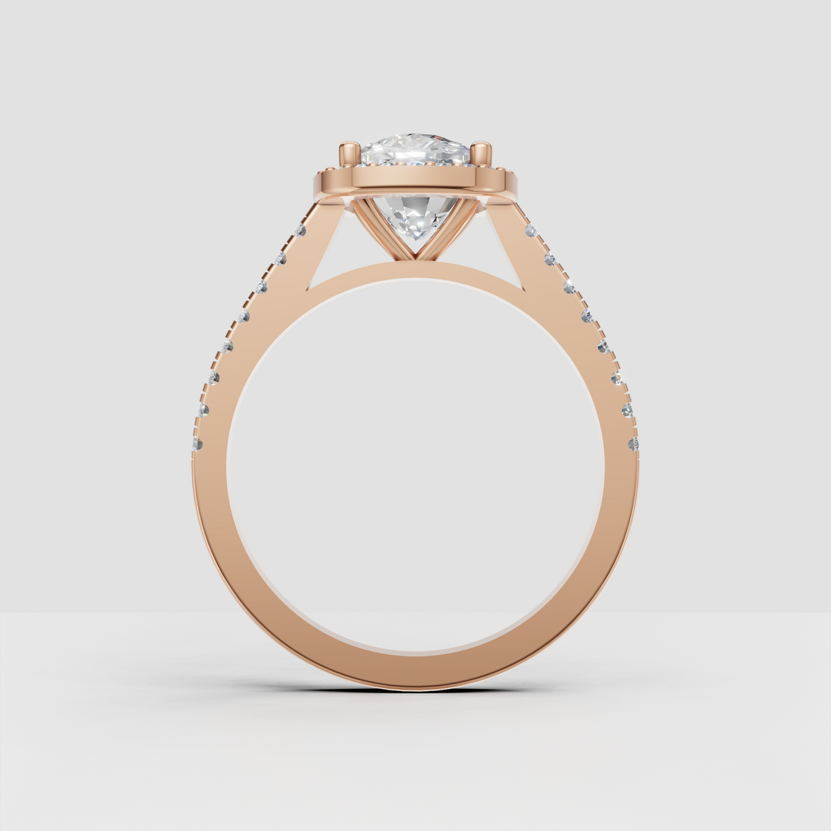 Oval diamond ring featuring a delicate round stone halo