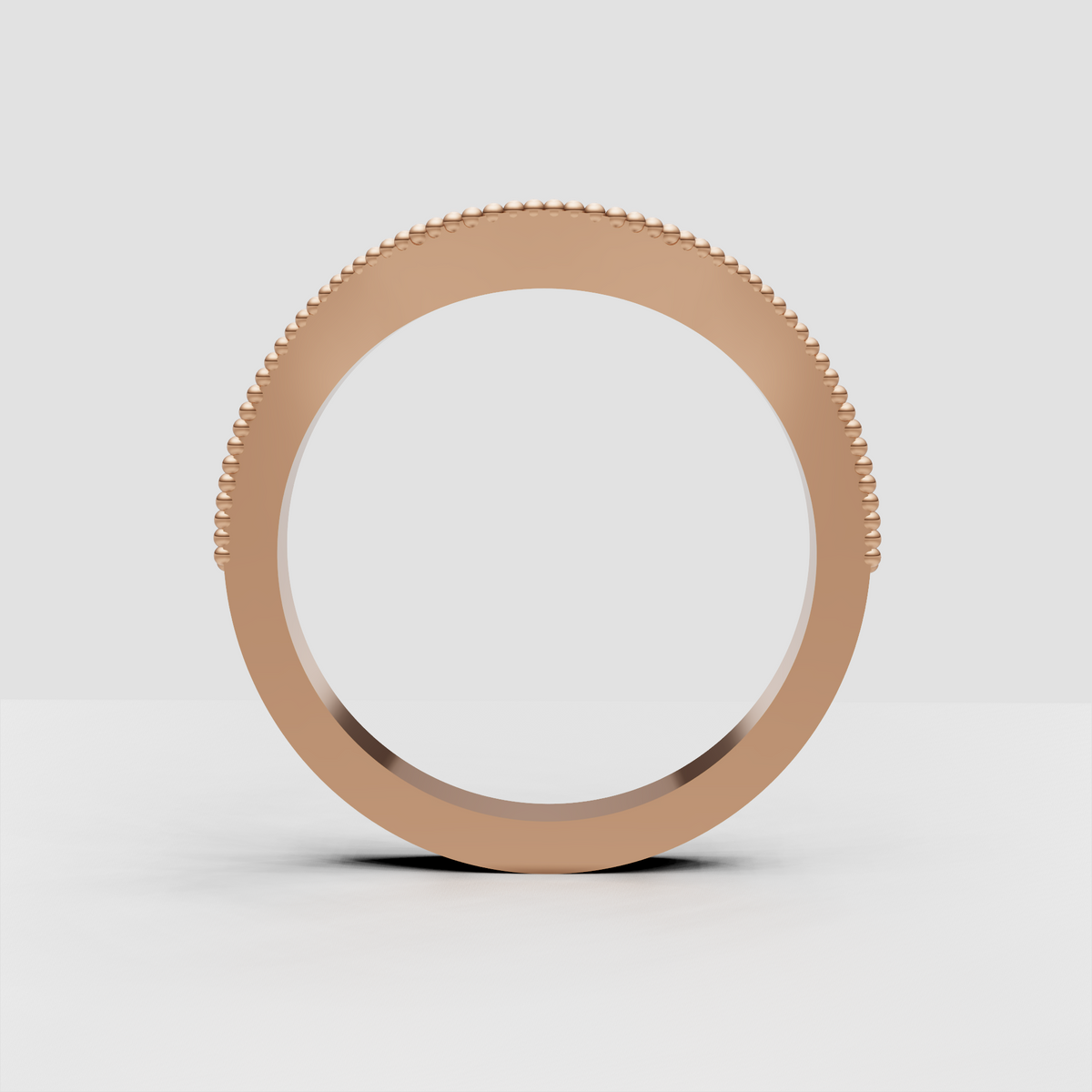 Round brilliant stones set in an ornate floral gold band