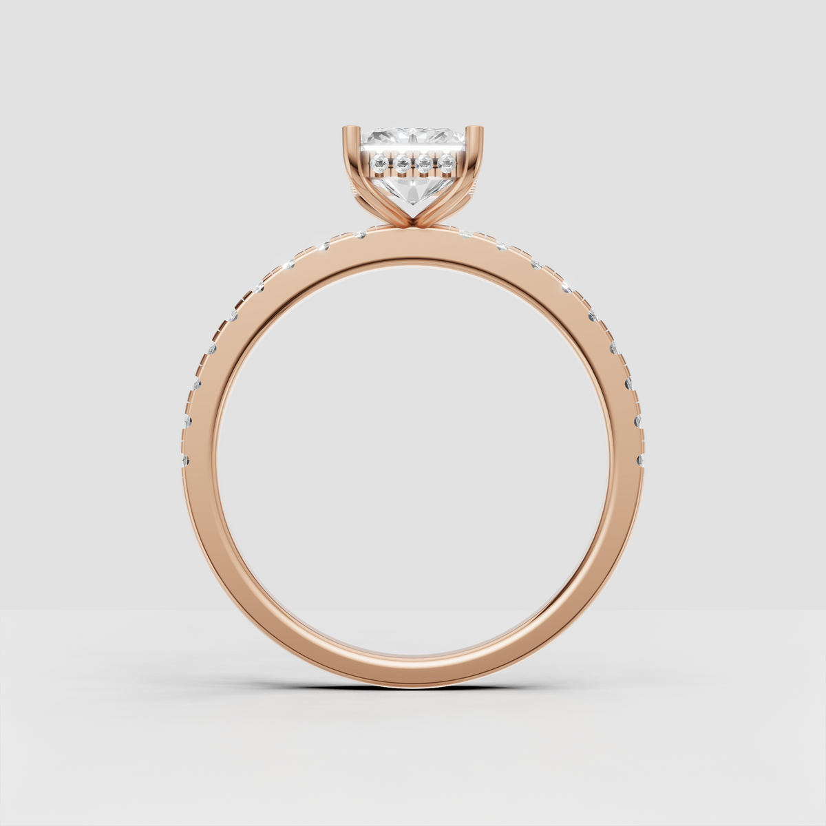 Radiant diamond ring featuring a hidden halo underneath