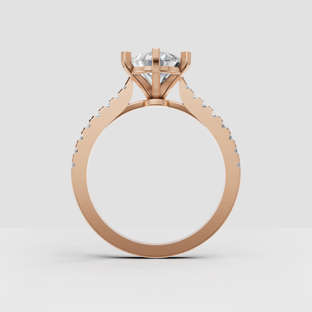 Pavé diamond pear engagement ring with polished yellow gold shank