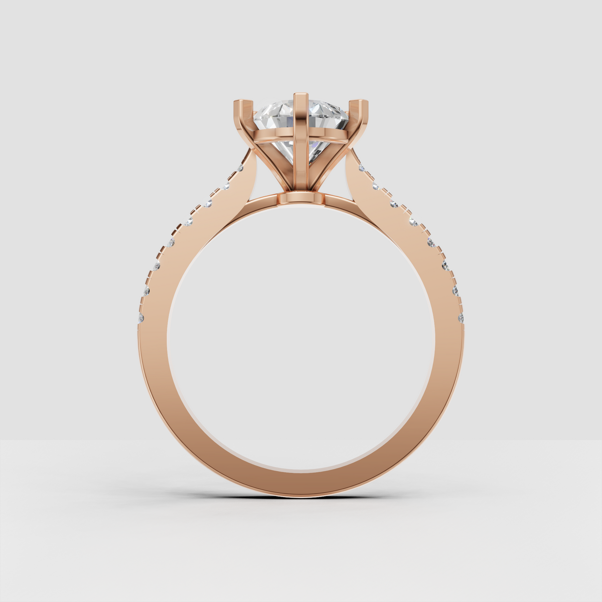 Pavé diamond pear engagement ring with polished yellow gold shank