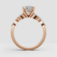 Oval solitaire ring with marquise diamond side accents