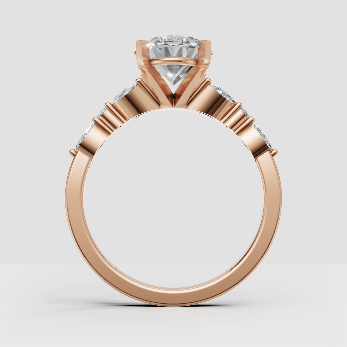 Oval solitaire ring with marquise diamond side accents