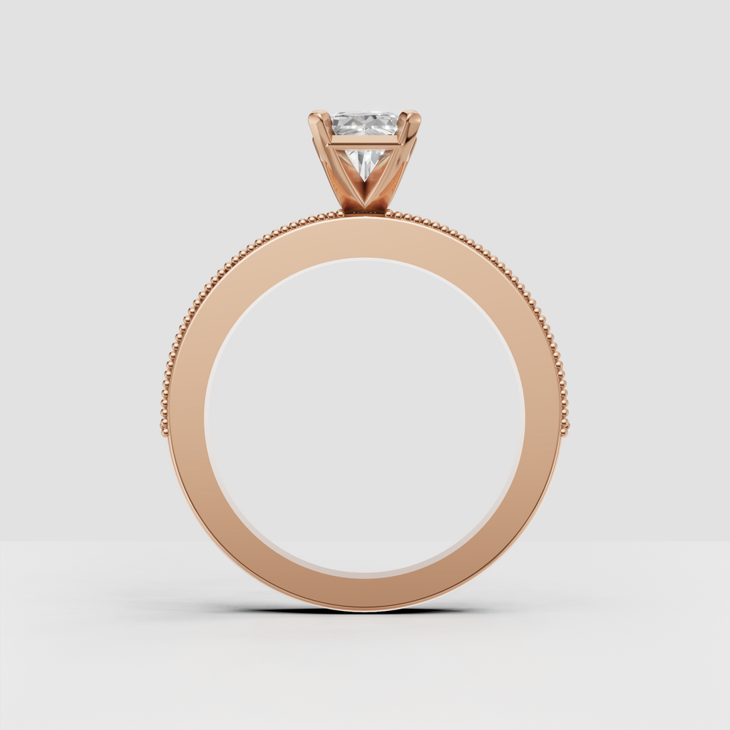 Radiant cut diamond bridal ring with polished gold shank and diamond accents