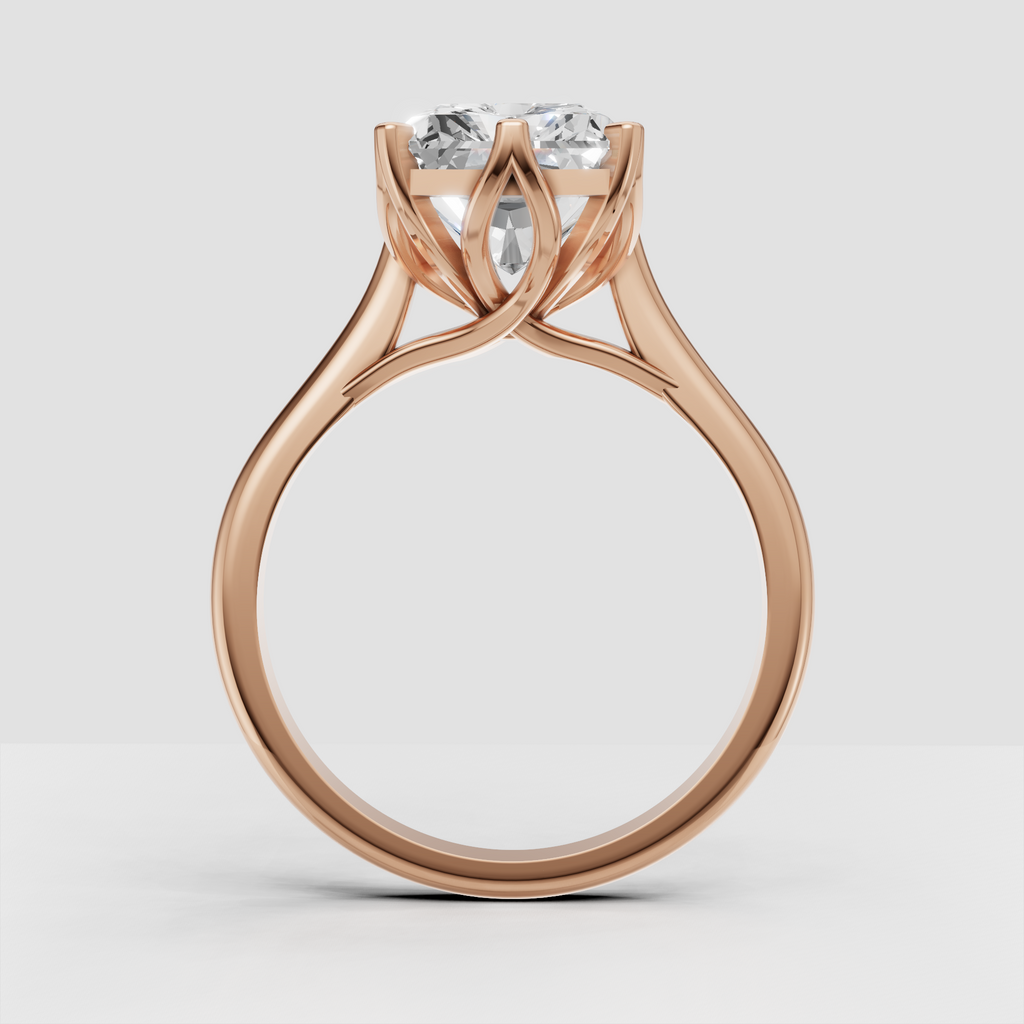 Elegant yellow gold ring featuring a large radiant cut center stone